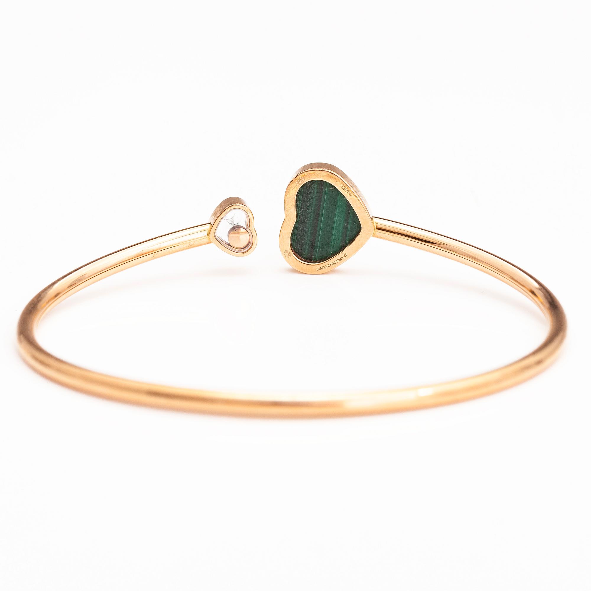 CHOPARD. A 18K gold bracelet "Happy hearts" with a diamond and malakite. Marked 857482, 6508783 and Made in Germany.