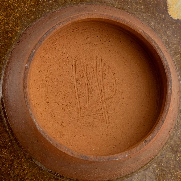 A group of three bowls, including Henning Nilsson, Höganäs.