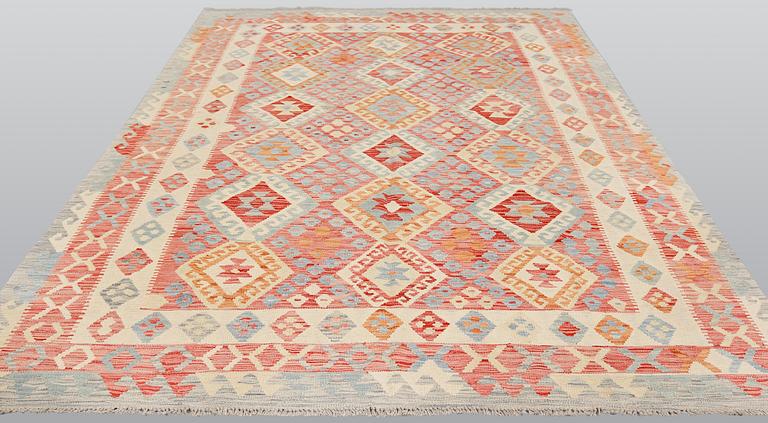 A carpet Kilim, ca 290 x 214 cm.