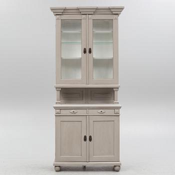 A two-part cabinet, around 1900.