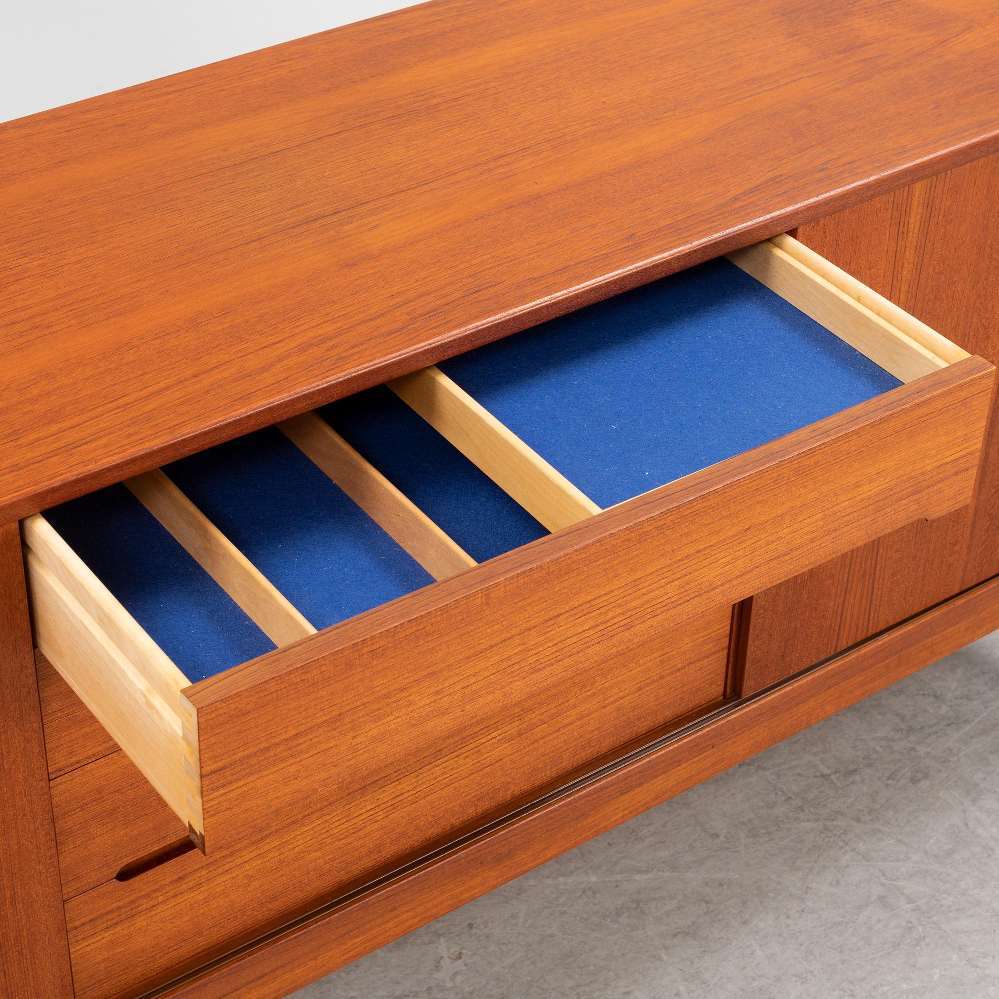 Nils Jonsson, a teak-veneered 'Arild' sideboards from Troeds, 1960's.