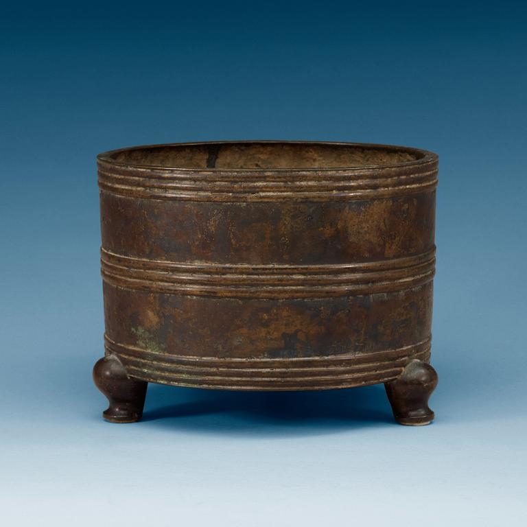 A large bronze tripod censer, Ming dynasty (1368-1644), with Xuande six character mark.