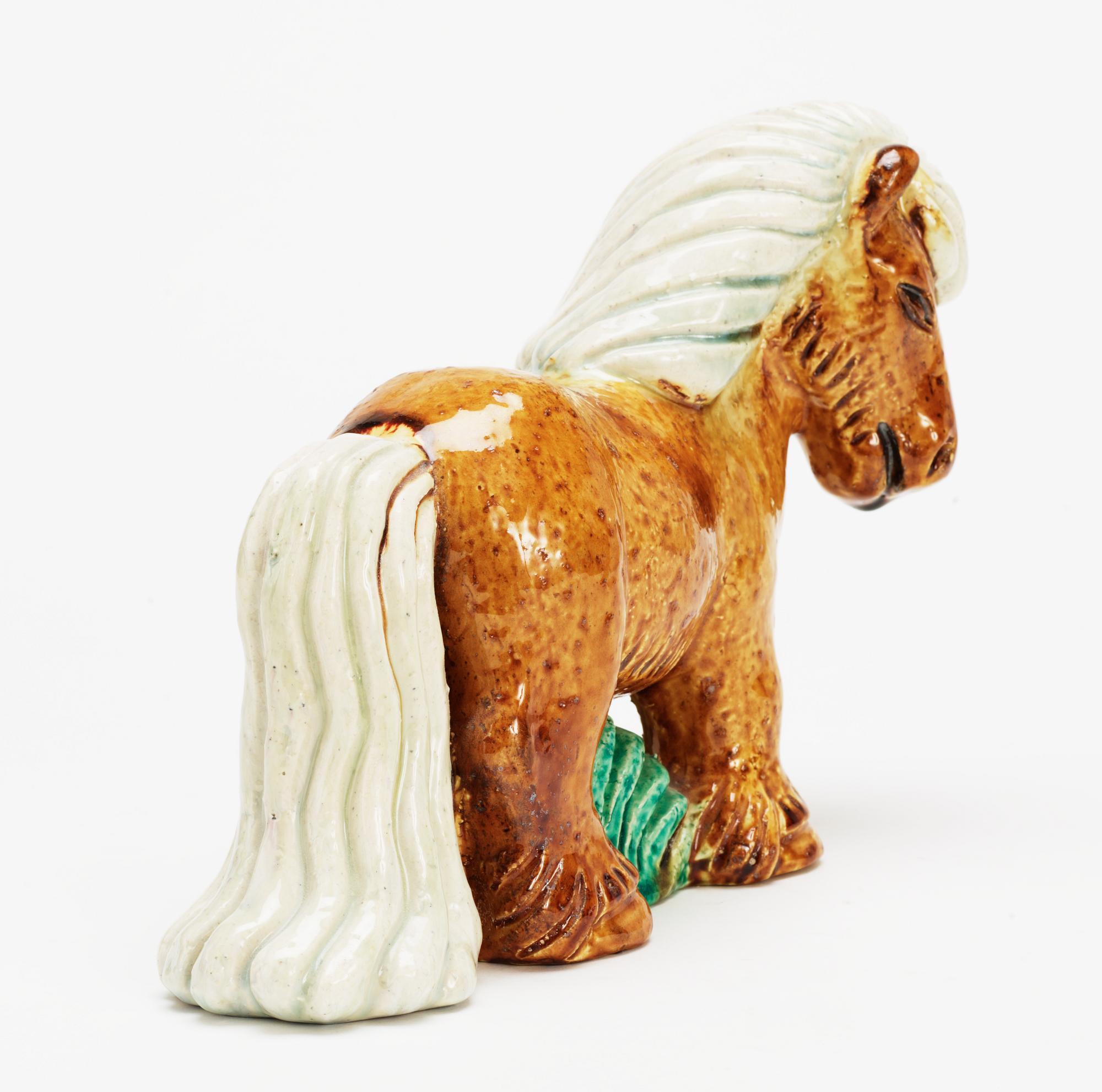A Gunnar Nylund stoneware figure of a horse, Rörstrand.