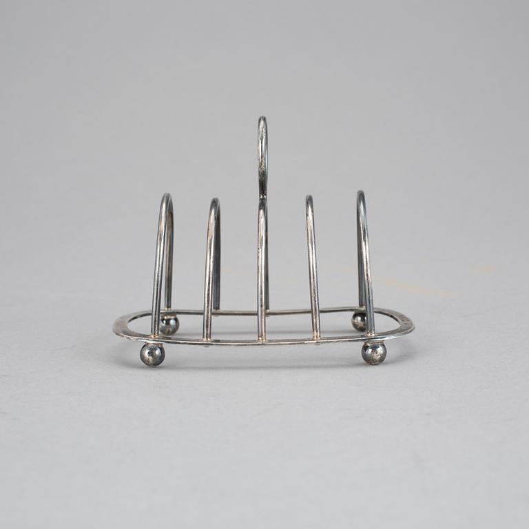 BRÖDSTÄLL, s k Toast rack, silver, London, 1887-88-tal. Vikt 64 g.