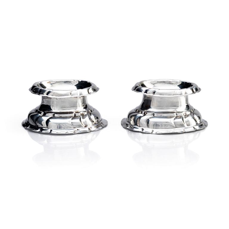 A pair of European Rococo 18th century silver salt-cellars.