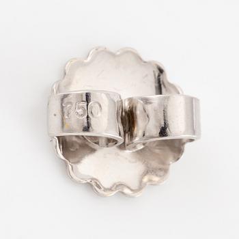 A pair of earrings in 18K white gold set with two round brilliant-cut diamonds.