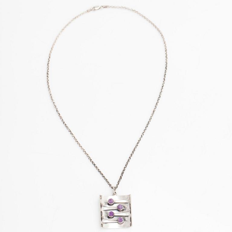 Elis Kauppi, a silver and amethyst pendant, Kupittaan Kulta, Turku 1964, with chain in sterling silver.