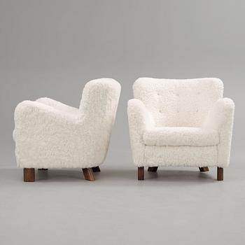 A pair of Fritz Hansen 'Model 1669' armchairs, Denmark.