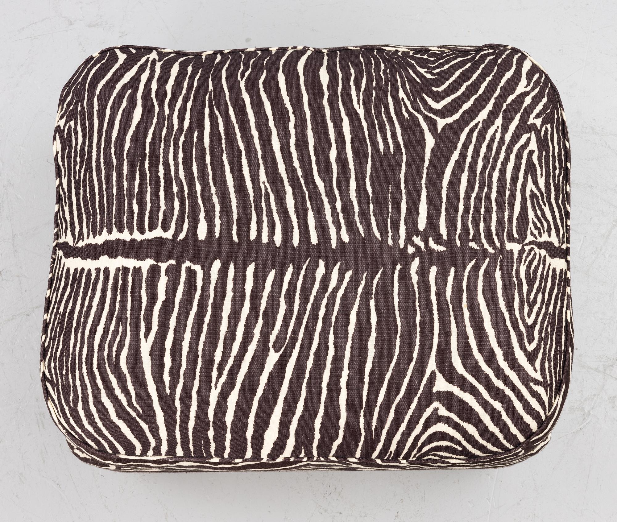 Josef Frank, a model 336 ottoman, Svenskt Tenn.