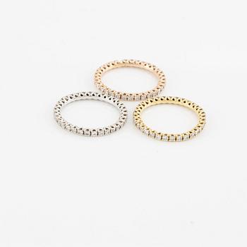Rings, three pieces, set with brilliant-cut diamonds.