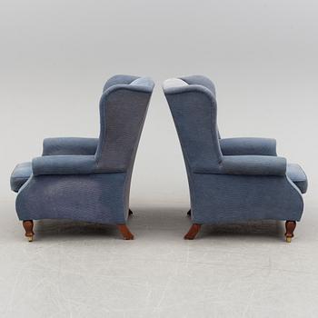 A pair of Parker Knoll 'York' wing chairs.