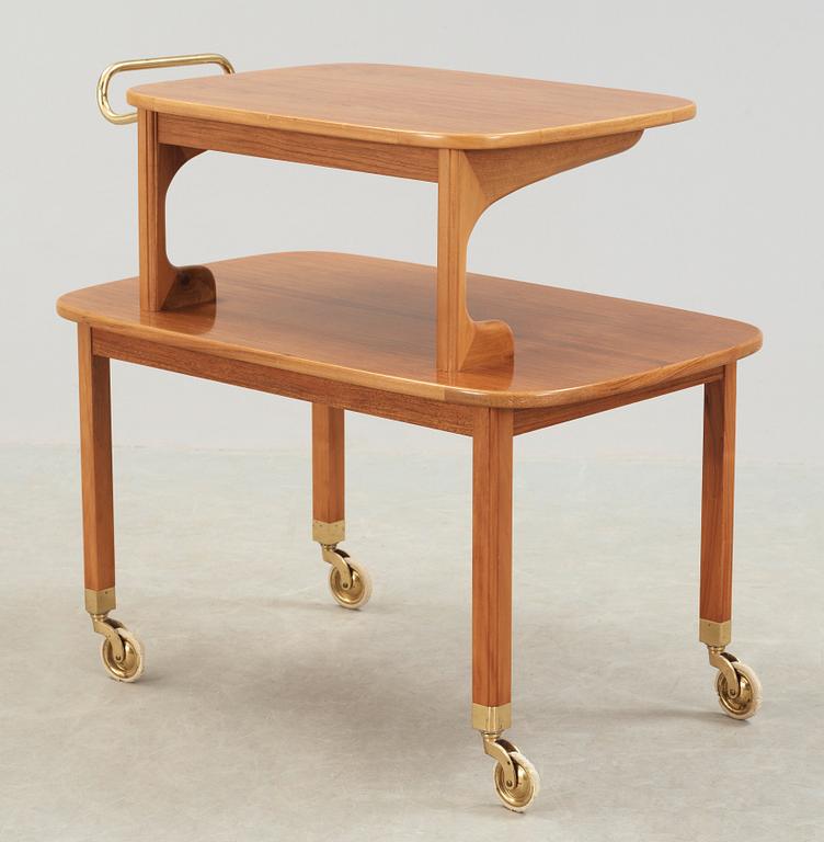 A Josef Frank walnut and mahogany serving trolley, Svenskt Tenn, probably 1950's.