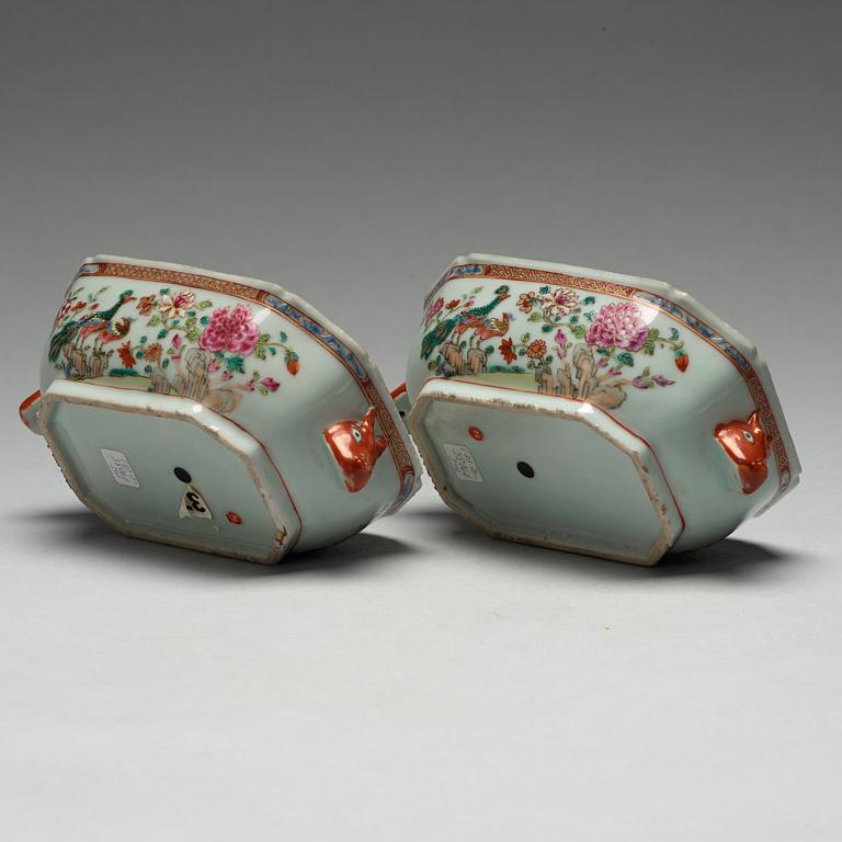 A pair of famille rose 'double peacock' tureens with cover and stands, Qing dynasty, Qianlong (1736-95).