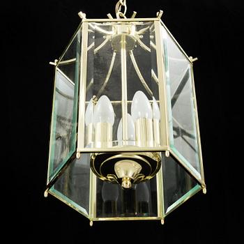 A 20th century brass hexagon hall ceiling lantern for three lights.