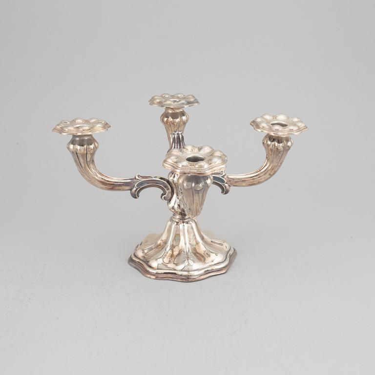 CG Hallberg, kandelaber samt ett par ljusstakar, silver, rokokostil, Stockholm, 1936 och 1935.