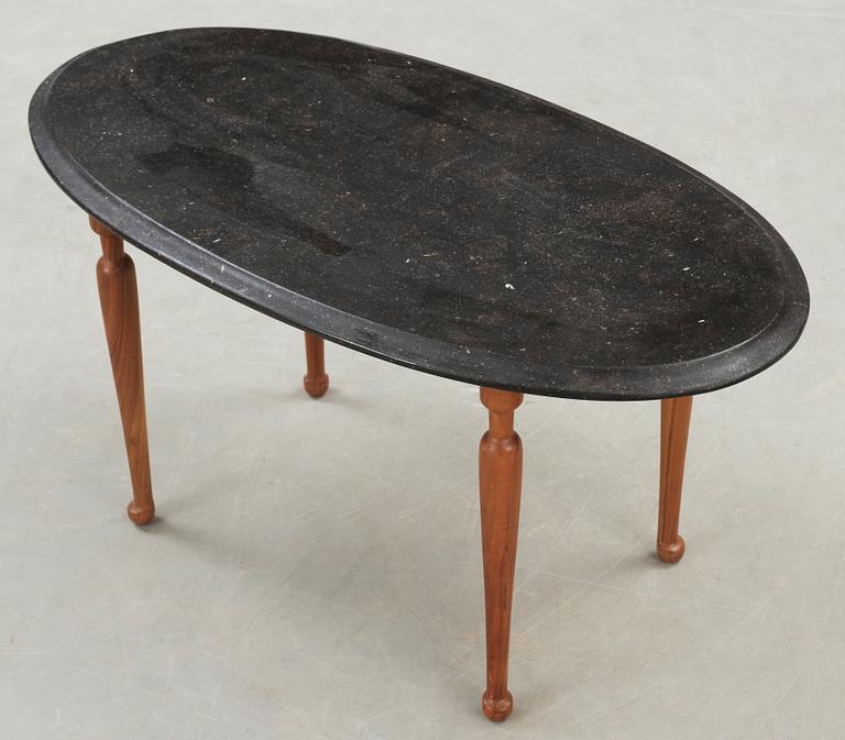 A Josef Frank black marble top table, Svenskt Tenn.