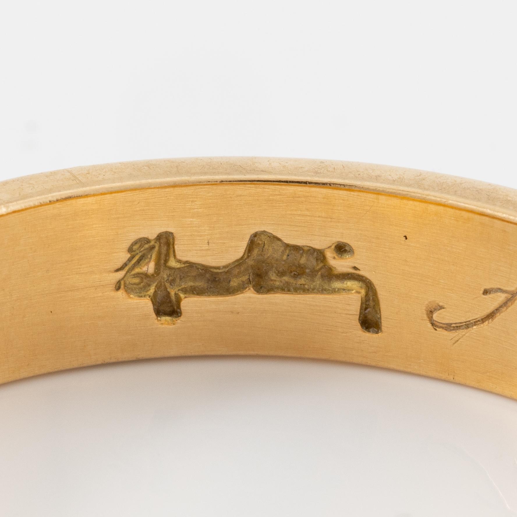 Efva Attling, ring 18K guld, "Amor Omnia Vincit",.