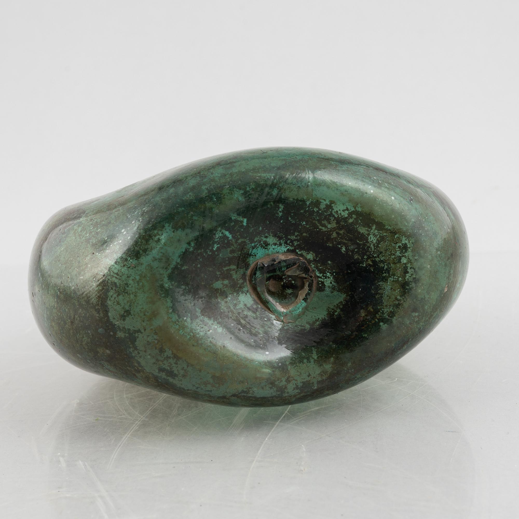 A turquoise tinted glass bottle, 19th century.