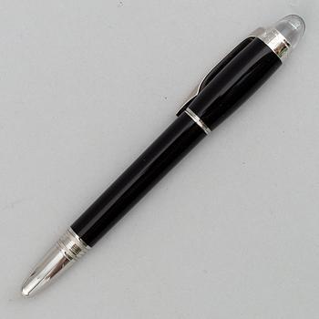 MOntblanc, a ball point pen and leather passport holder.