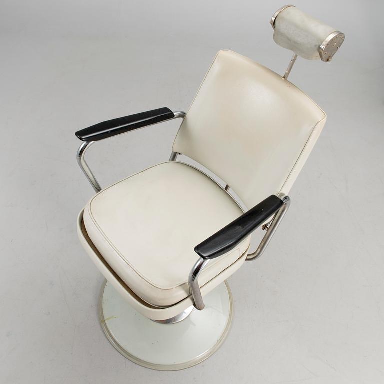 A 1950s barber chair.