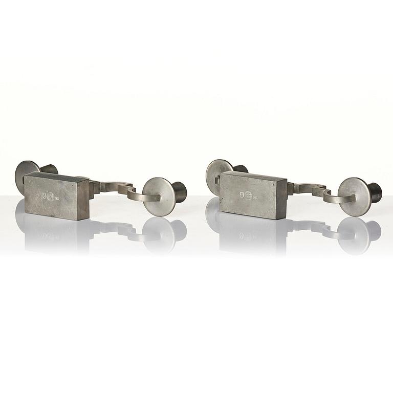Nils Fougstedt, a pair of pewter candelabra model "A 1047", Firma Svenskt Tenn, Stockholm 1932.