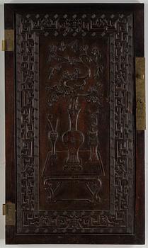 A Chinese wooden panel, Qing dynasty.