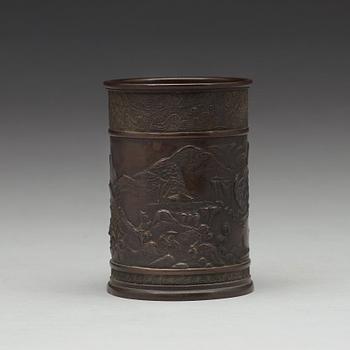 A bronze brush pot, Qing dynasty, circa 1900.