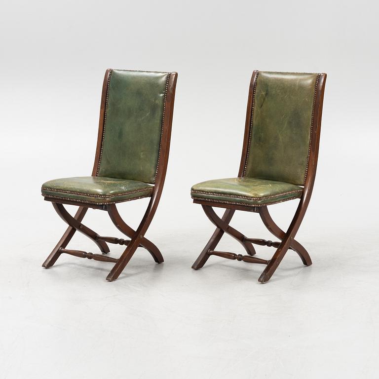 A set of five mahogany and leather upholstered chairs, England, second half of the 20th Century.