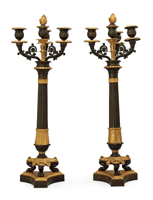 A pair of French Empire 19th century four-light candelabra.