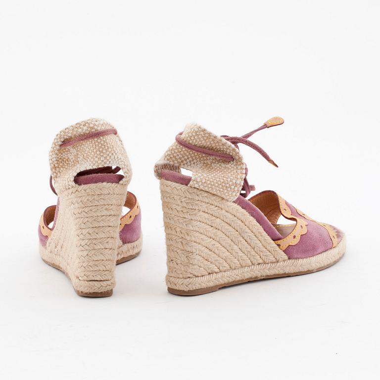 LOUIS VUITTON, a pair of straw and pink suede wedge sandals.