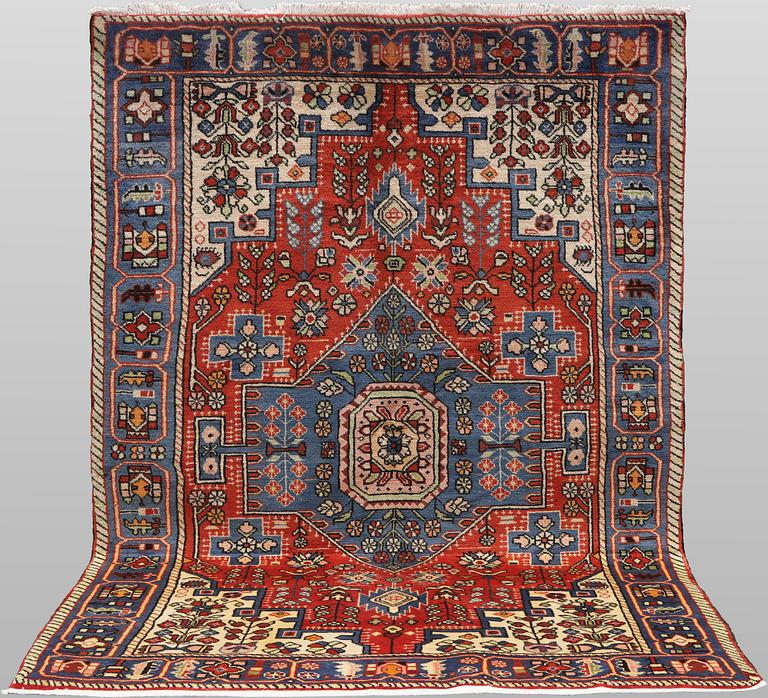 A Hamadan rug, 213 x 138 cm.