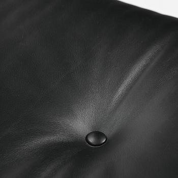 Charles & Ray Eames, an "Eames Lounge Chair" with ottoman, Vitra, 2000s.