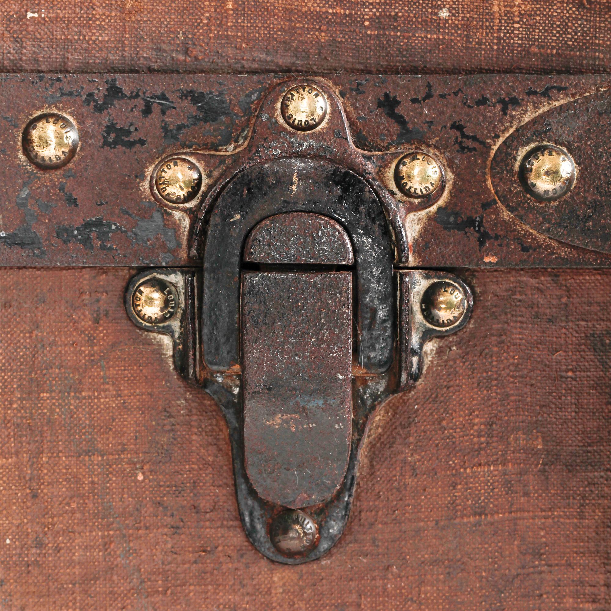 LOUIS VUITTON, a brown trunk, late 19th century.