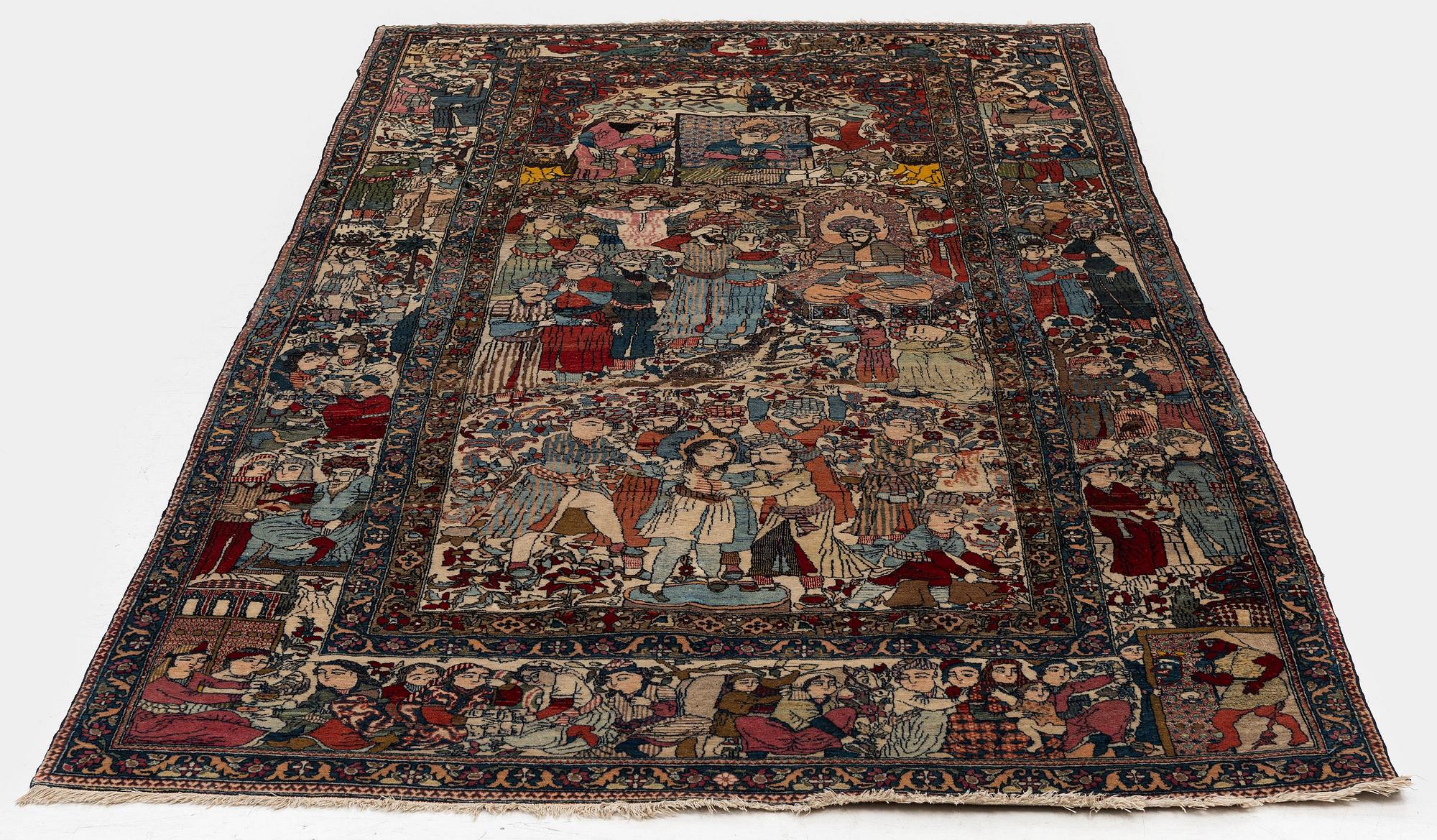 An antique Isfahan carpet, Central Persia, c. 260 x 138 cm.