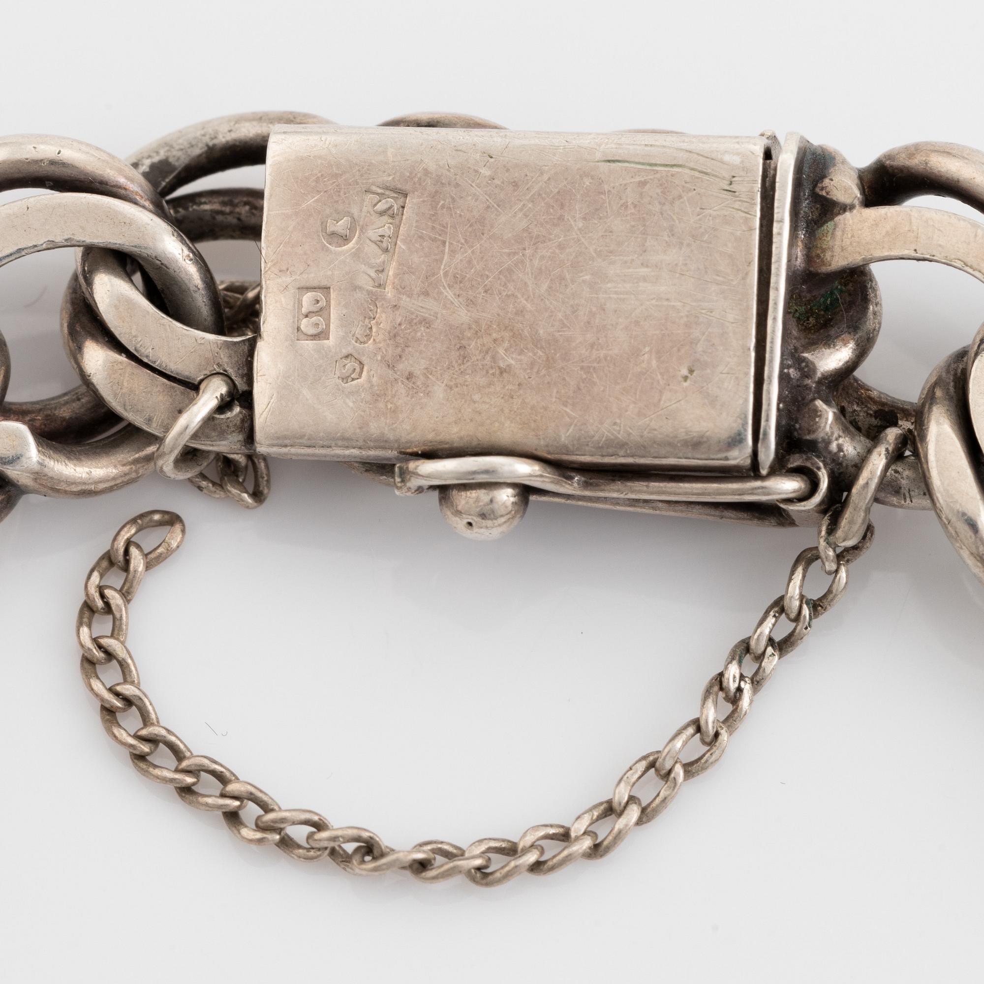 Silver bracelet.