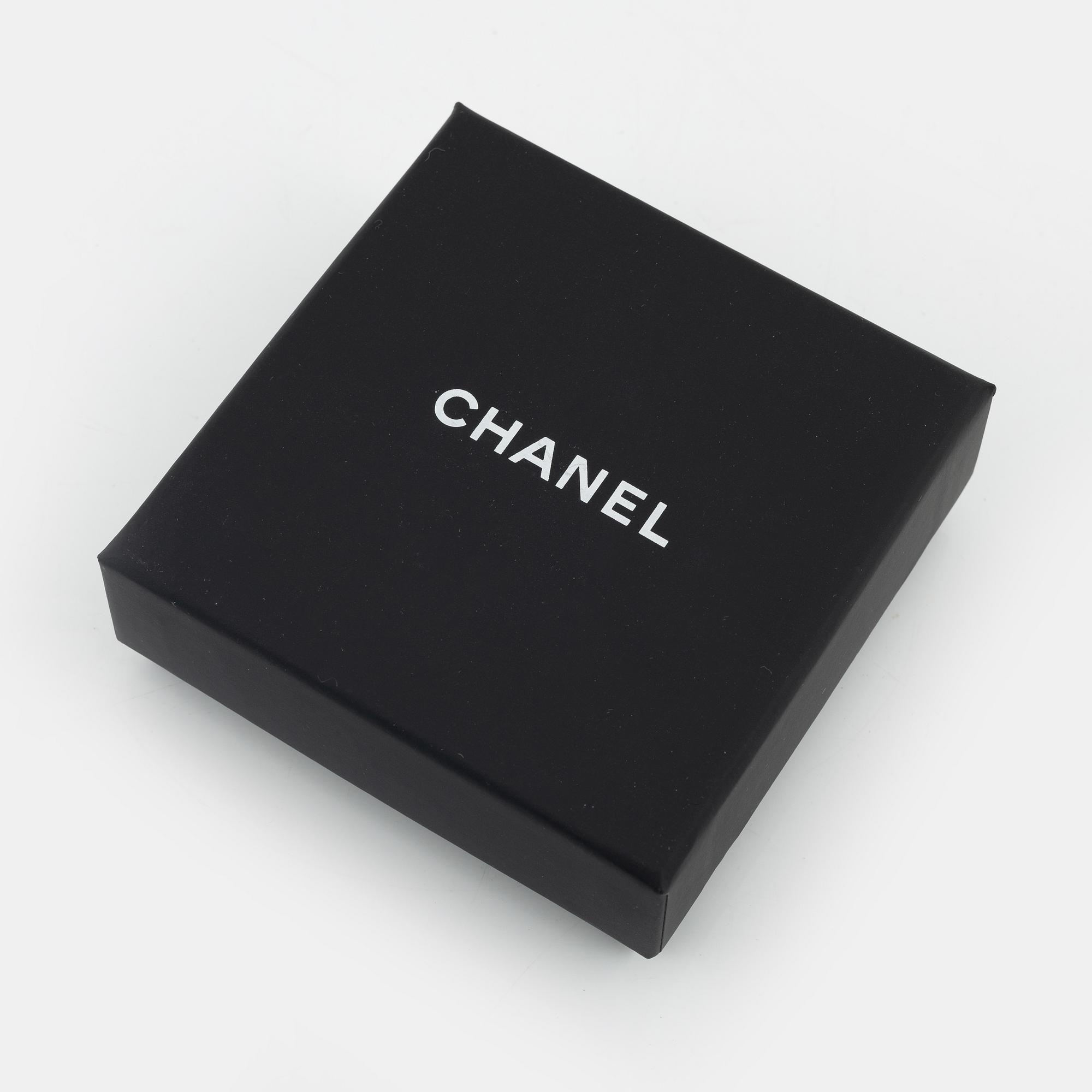 Chanel, a silvermetal, imitation pearl and crystal brooch, 2018.