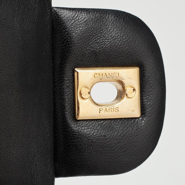 CHANEL, a quilted blue leather "Double Flap" shoulder bag.