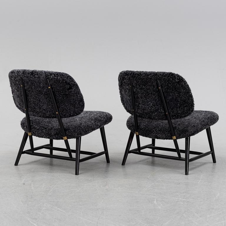 A 1950's pair of 'TeVe' easy chairs by Alf Svensson.