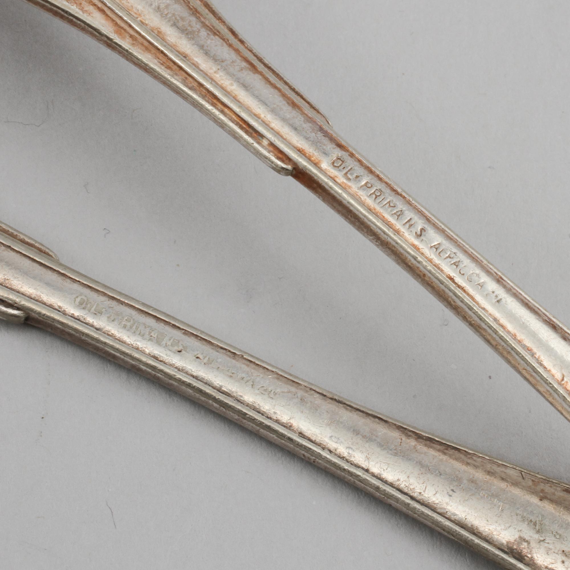 FISKBESTICK, nysilver, 15 st, märka med loggotyp från Stockholmsutställningen 1930 samt restaurangen Tre Remmare.