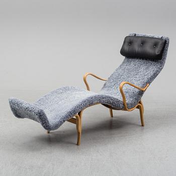 A beechwood 'Pernilla' lounge chair by Bruno Mahtsson for Karl Mathsson, dated 1960.