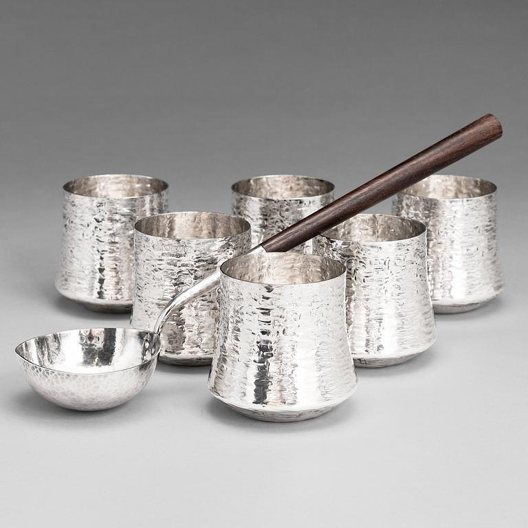 TAPIO WIRKKALA, A silver punch ladle and six silver beakers, marked TW,  Kultakeskus, Hämeenlinna, Finland 1976 an 1974.