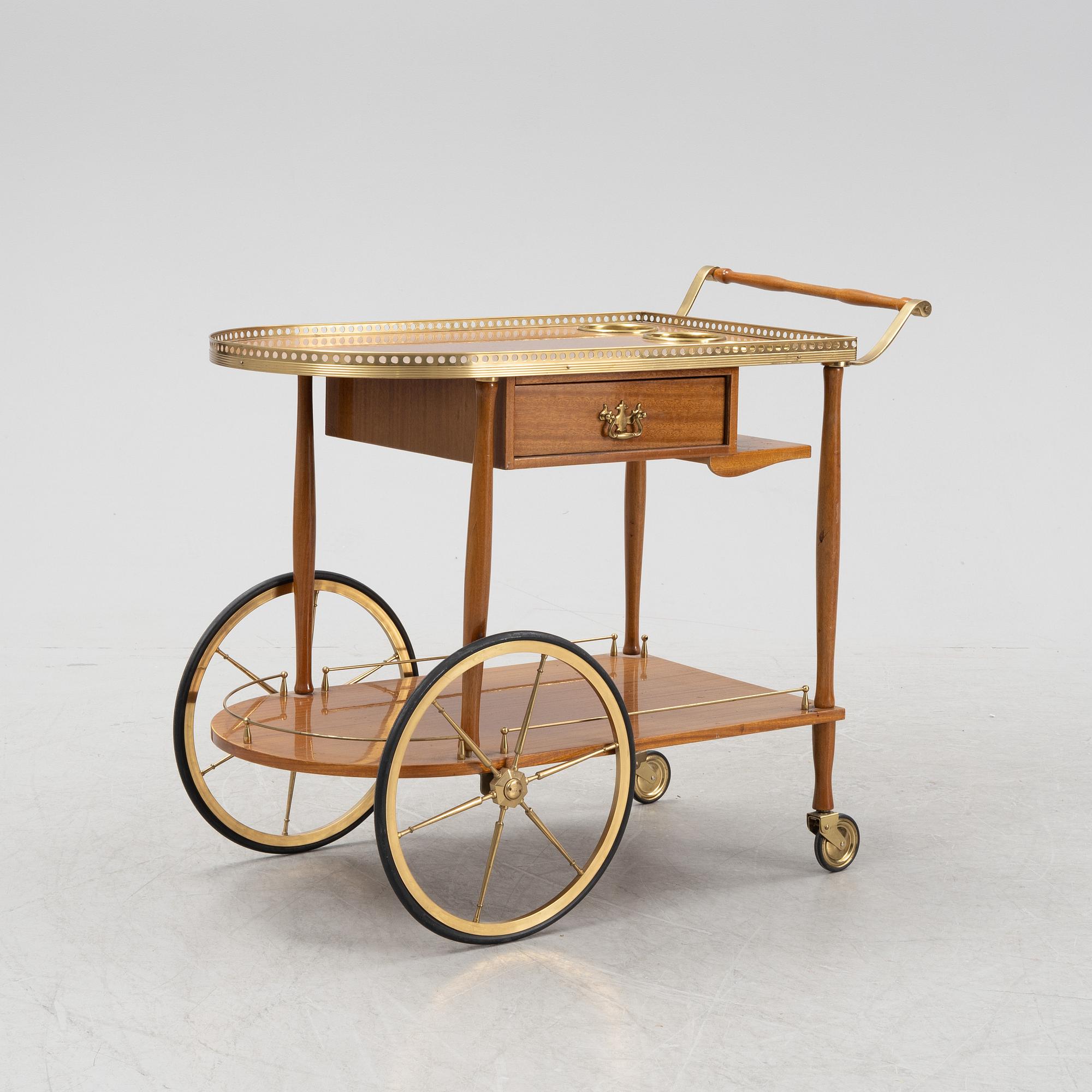 A mahogany-veneered serving trolley, mid 20th Century.