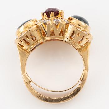 Ring, Evert Lindberg, 18K gold, set with star sapphires and rubies, as well as brilliant-cut and octagonal-cut diamonds.