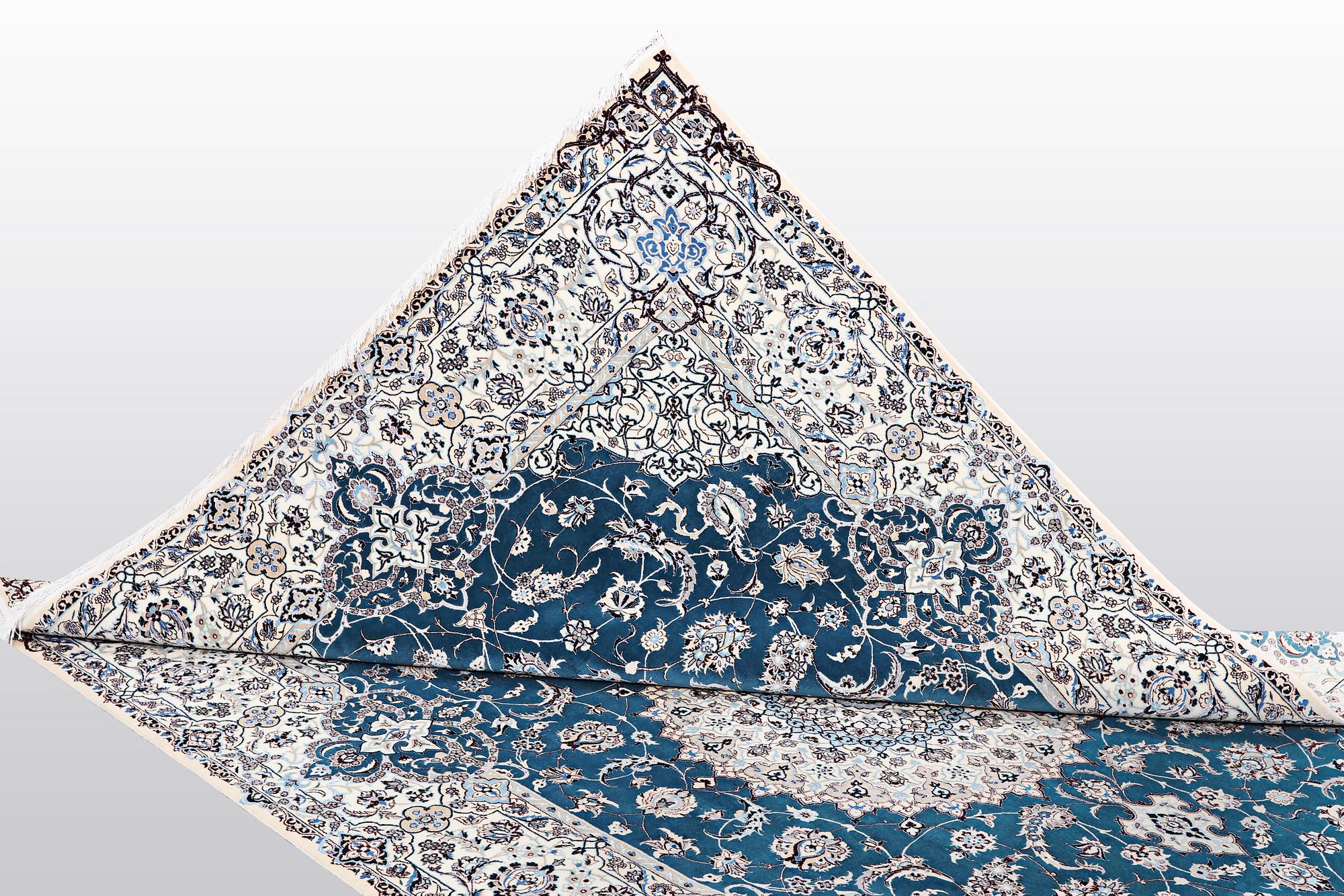 A carpet, Nain, part silk, 6 Laa, ca 312 x 208 cm.