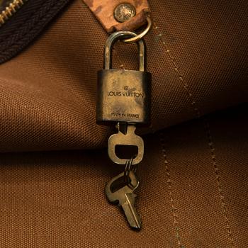 Louis Vuitton, a Monogram Canvas 'Keepall 55 Bandoulière' weekend bag.