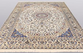 A carpet, Nain part silk, 364 x 256 cm.