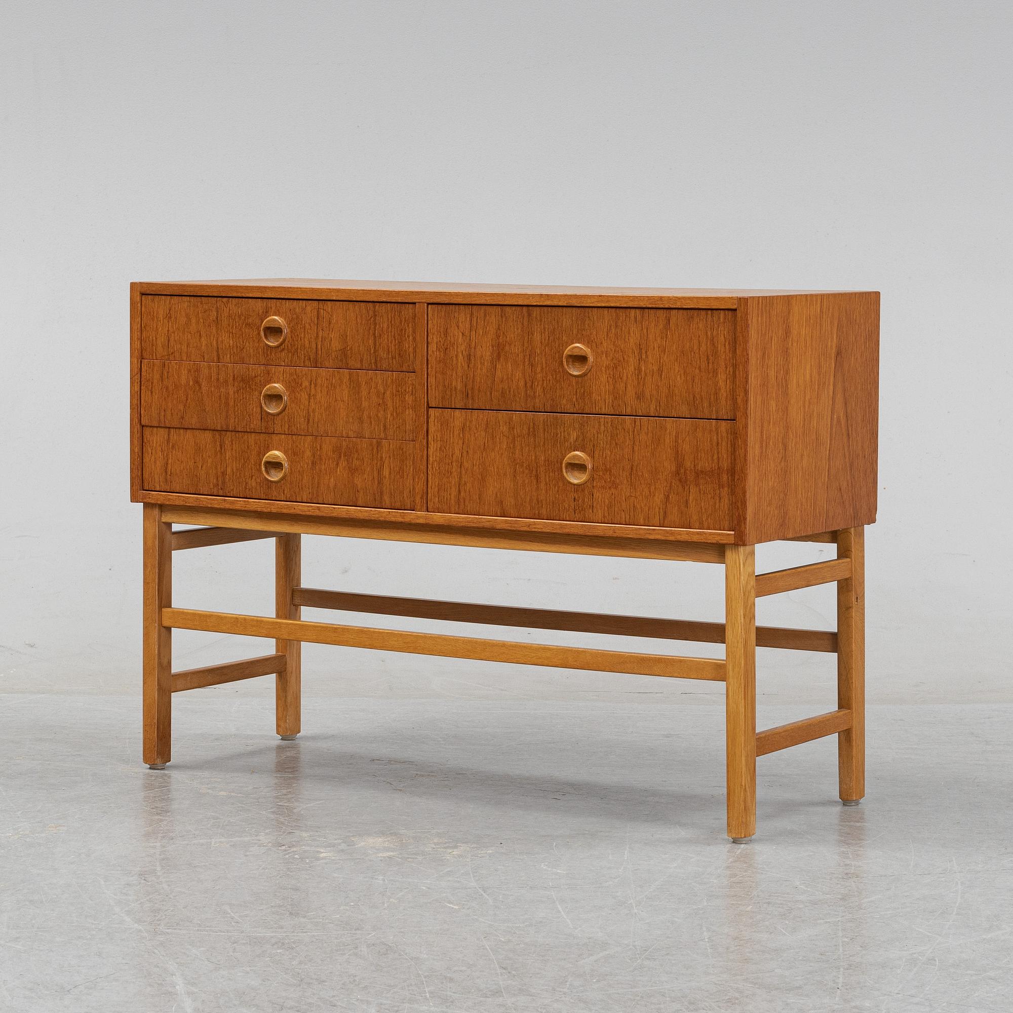 A 1950's/60's teak veneered chest of drawers.