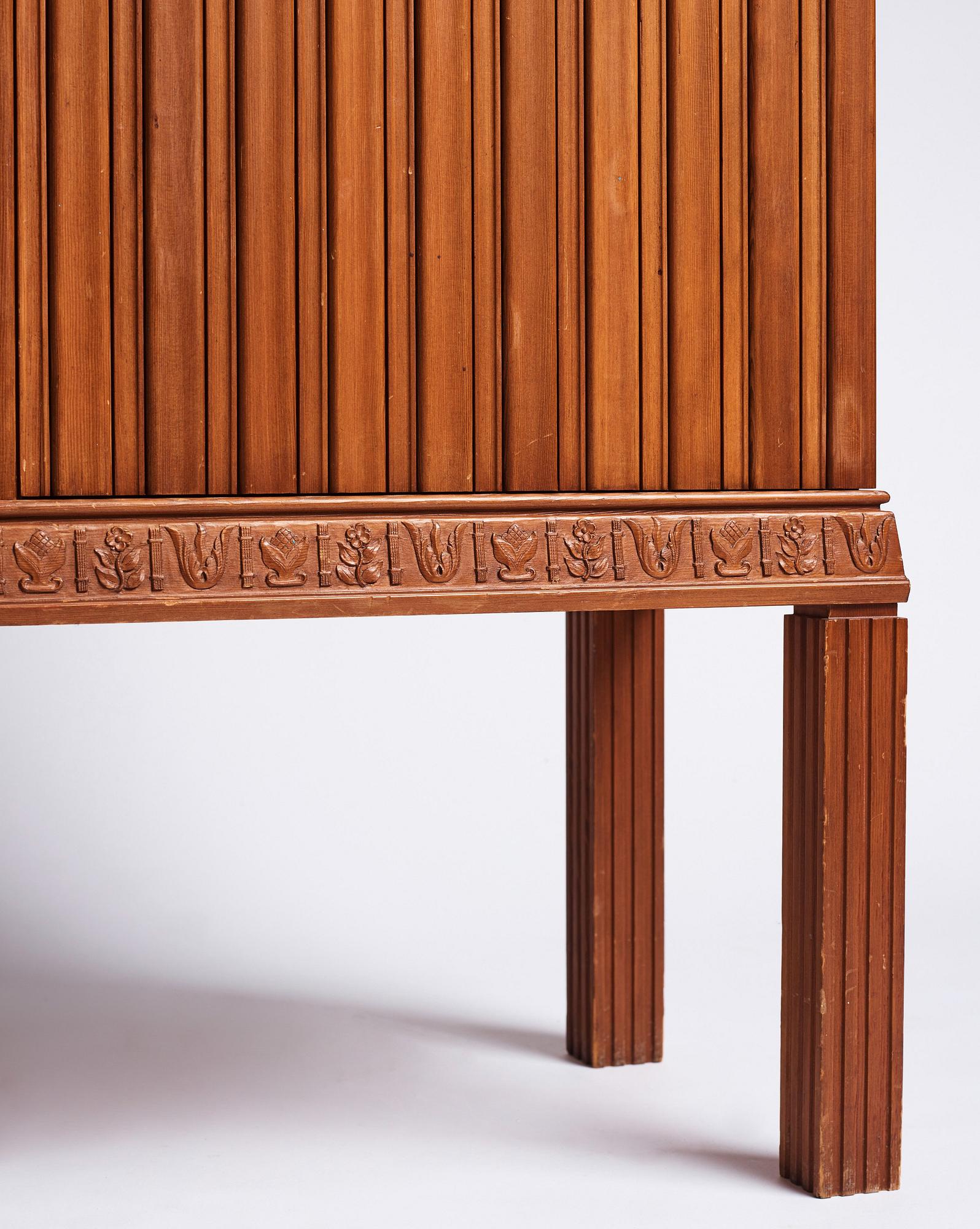 A Swedish Modern stained pine cabinet, 1940s.
