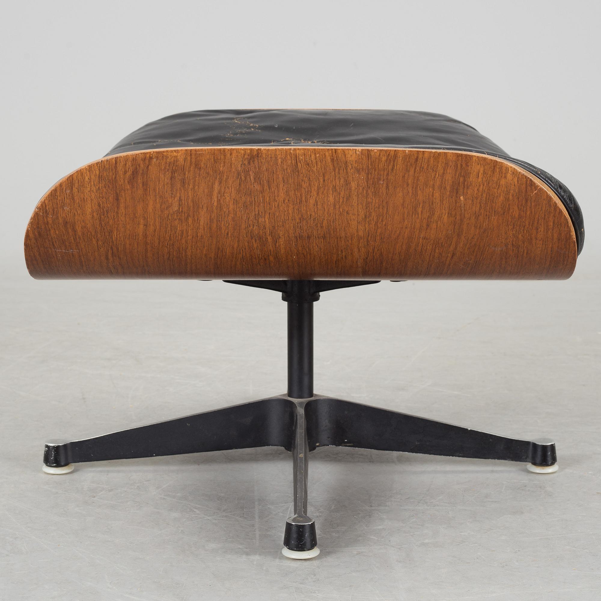 An easy chair and ottoman by Charles & Ray Eames, Herman Miller, USA, produced with licence by Hille, London.