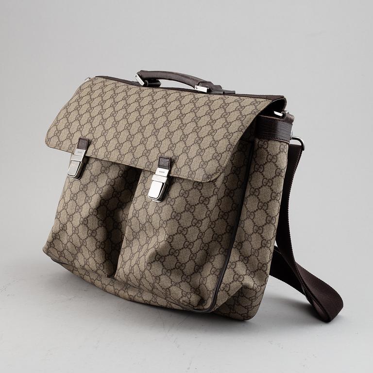 Gucci, a messenger bag.